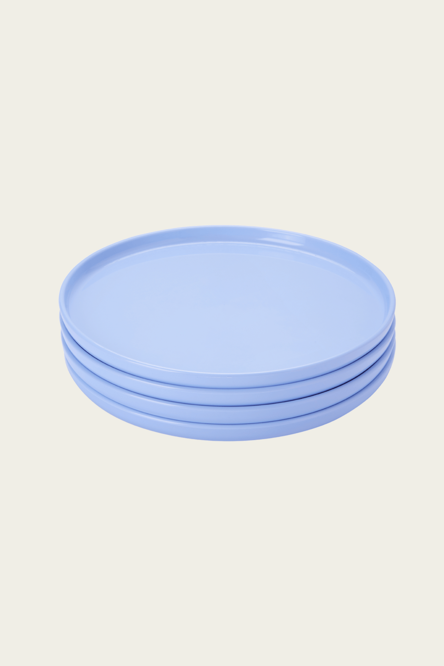 stack of four pastel blue Recette plates