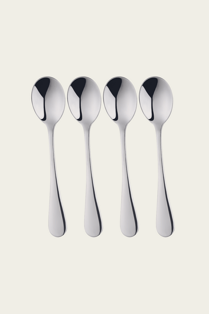 set of four stainless steel spoons